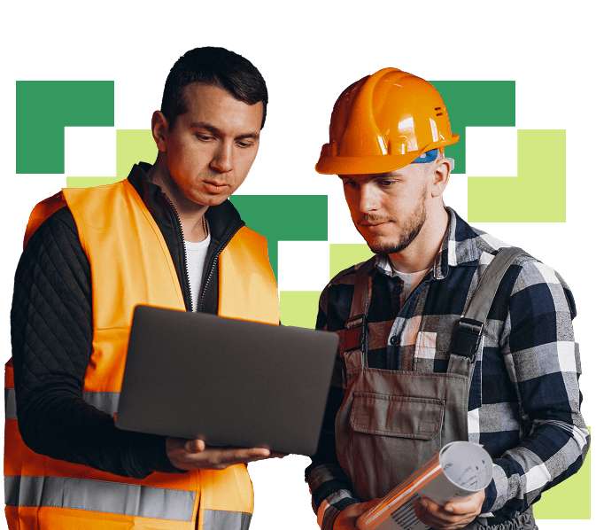 Dois operários olhando um notebook